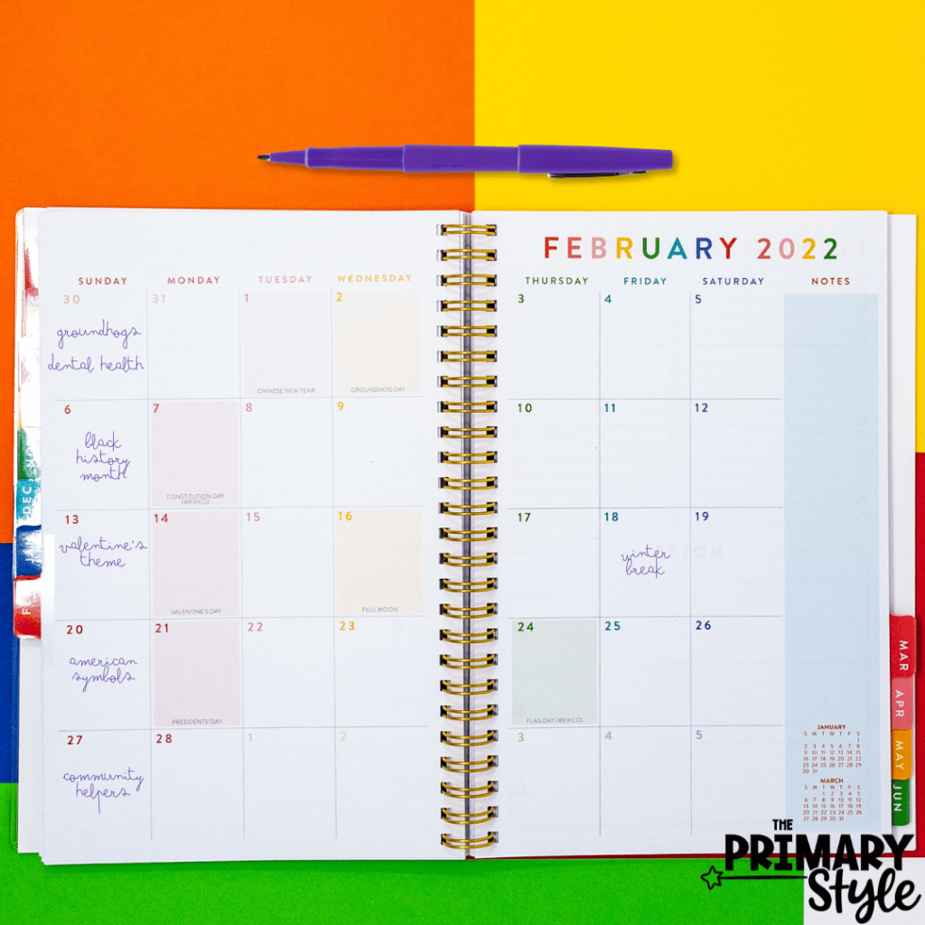 This image features a planner opened to February. It has examples of February themes for each week to make planning a year of lessons easier.